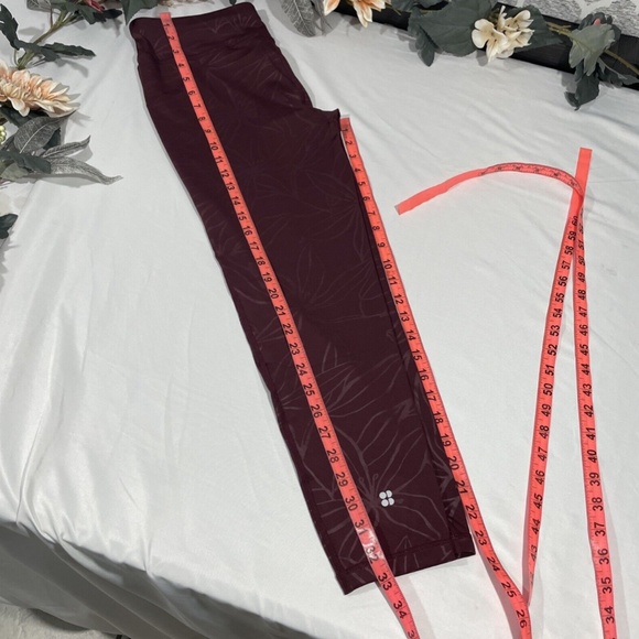 NWT Sweaty Betty [ Large ] Floral All Day Embossed Leggings in Plum Red - Picture 12 of 12